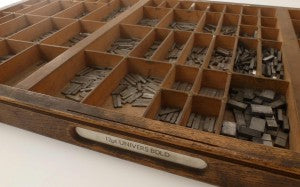 Loose type in a case - Univers bold 12 point A typecase containing loose type for manual typesetting - 12 point Univers bold