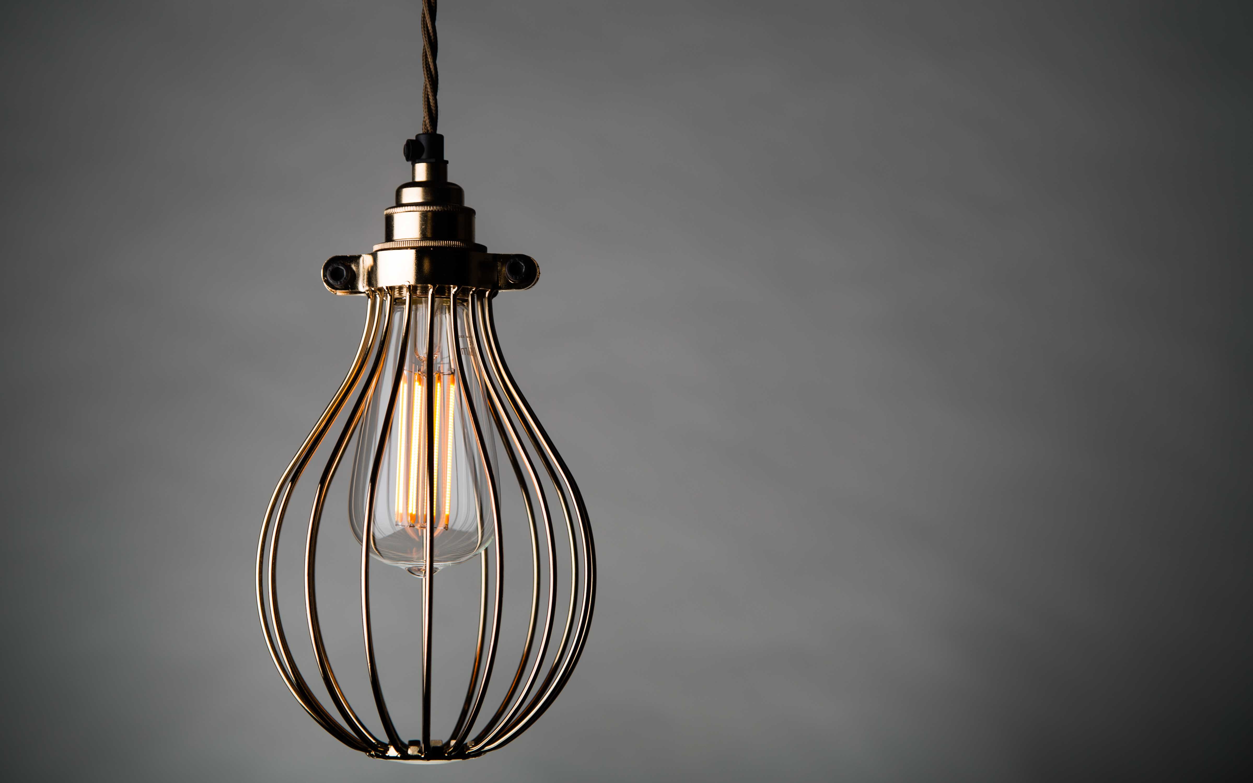 Why We Love Wire Cage Pendant Lighting