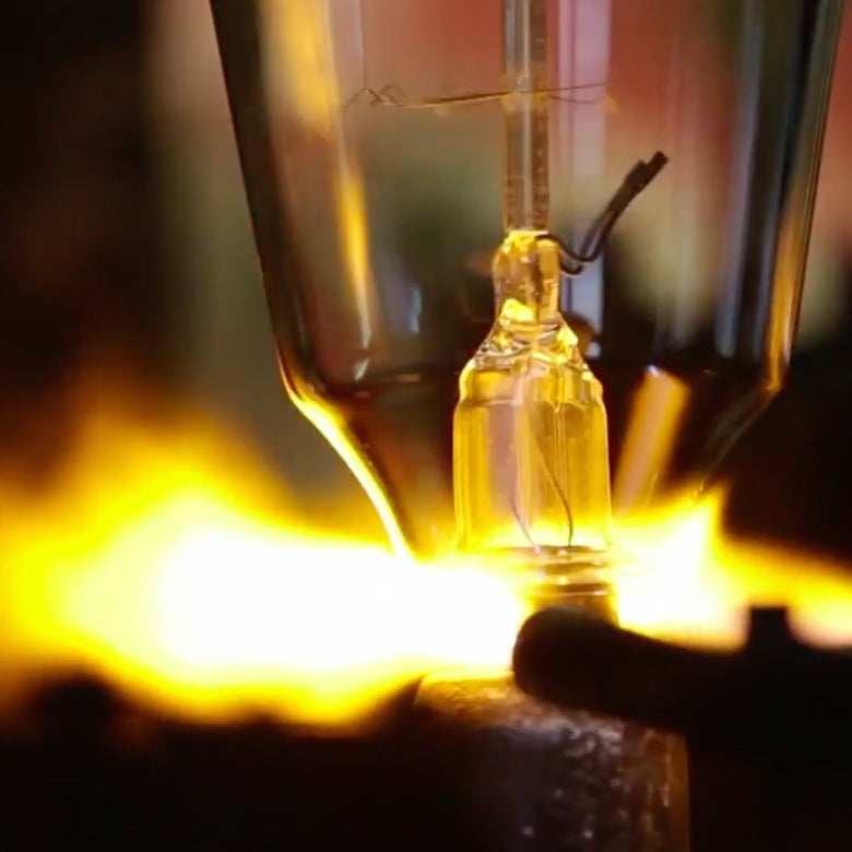 Filament light bulbs being made