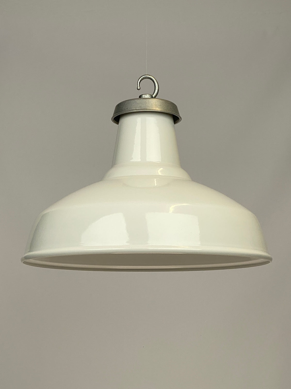An example of a white enamel 36cm diameter Reflector Shade from our Worn Lighting collection.