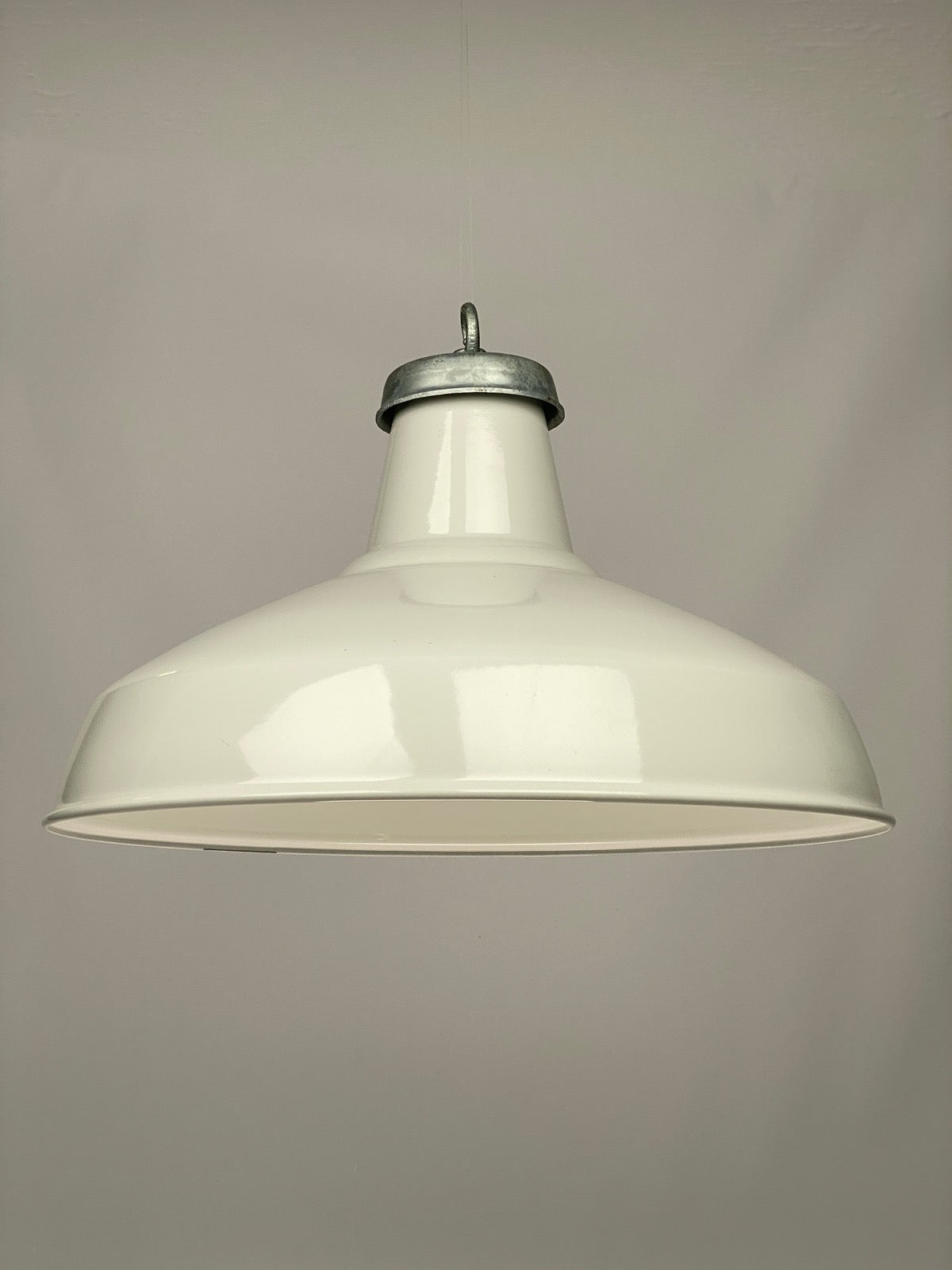 An example of a white enamel 50cm lamp shade available in Worn Lighting.